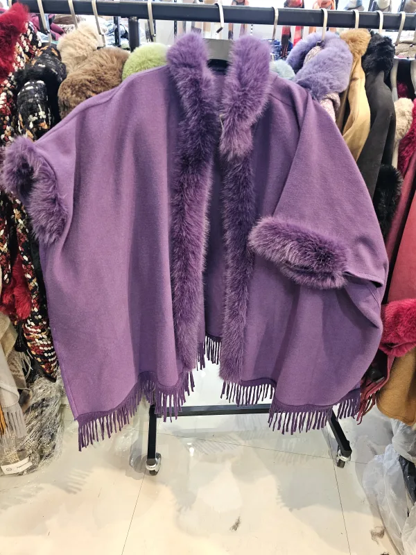 Poncho Maglioniki | Dresses of my World