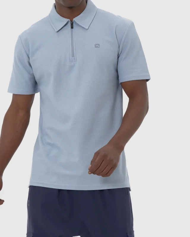 POLO ZIP KETEN INDIGO – QABA’IL S25 | AMCOSMETIK