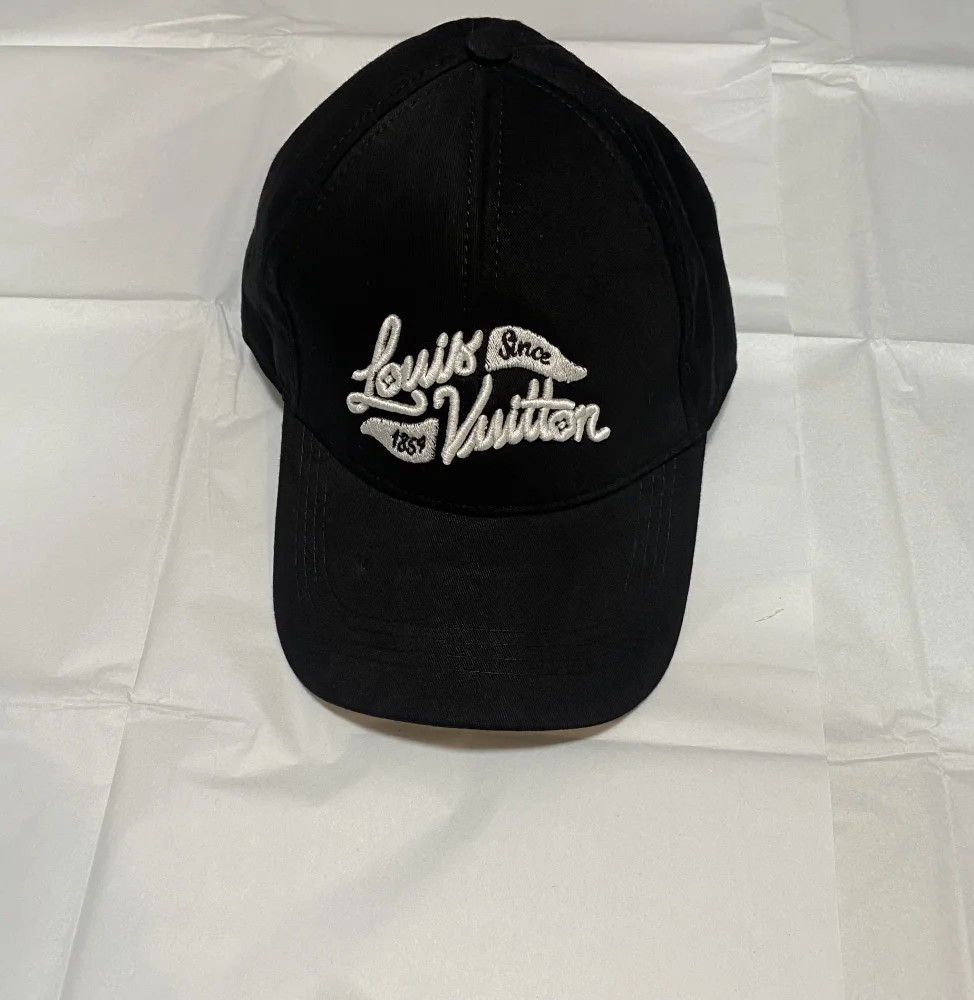Louis Vuitton Cap Black Print | MASSIMOLUXURYOUTLET