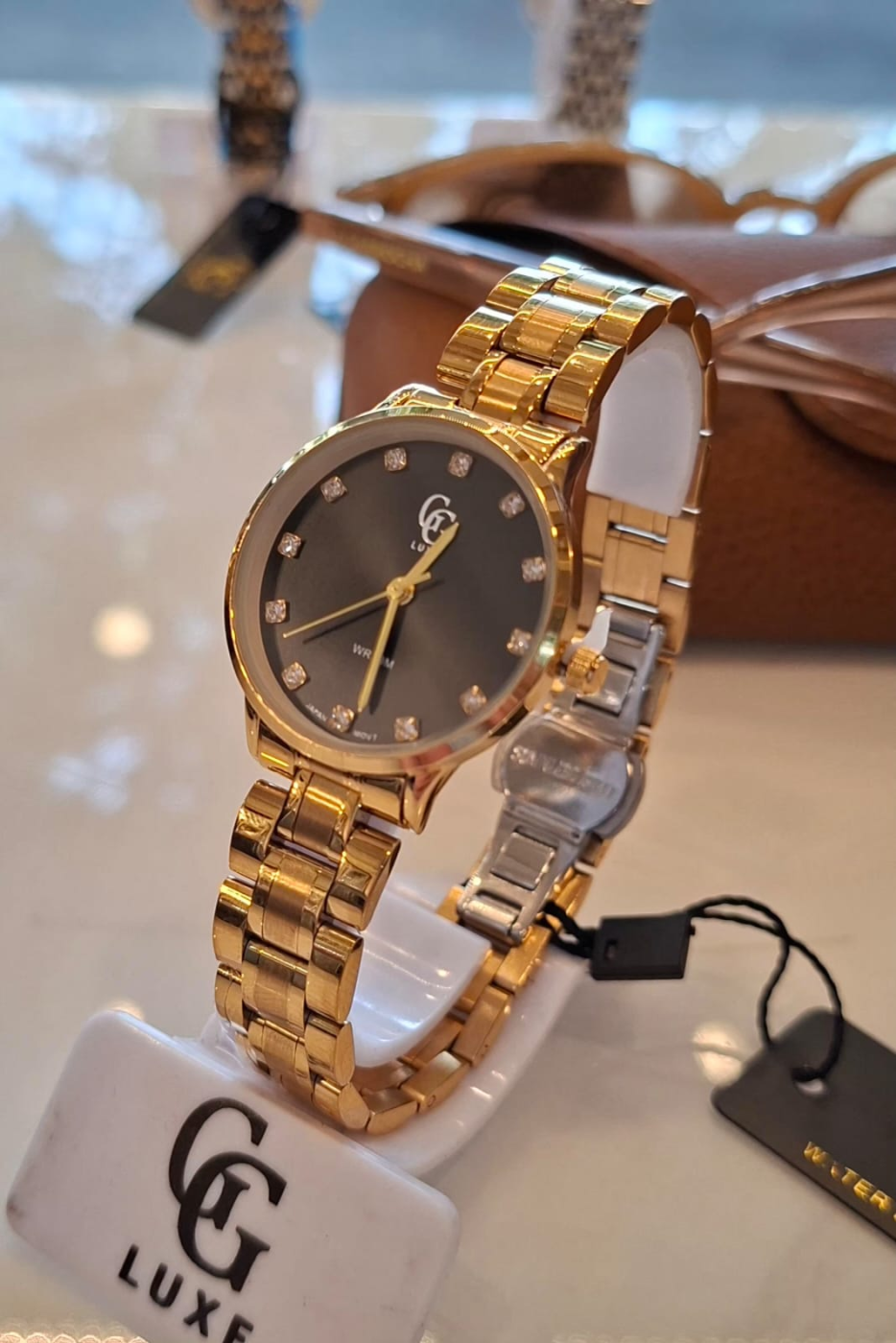 Relógio GGLux Feminino Gold fundo preto S 1813 | Definne