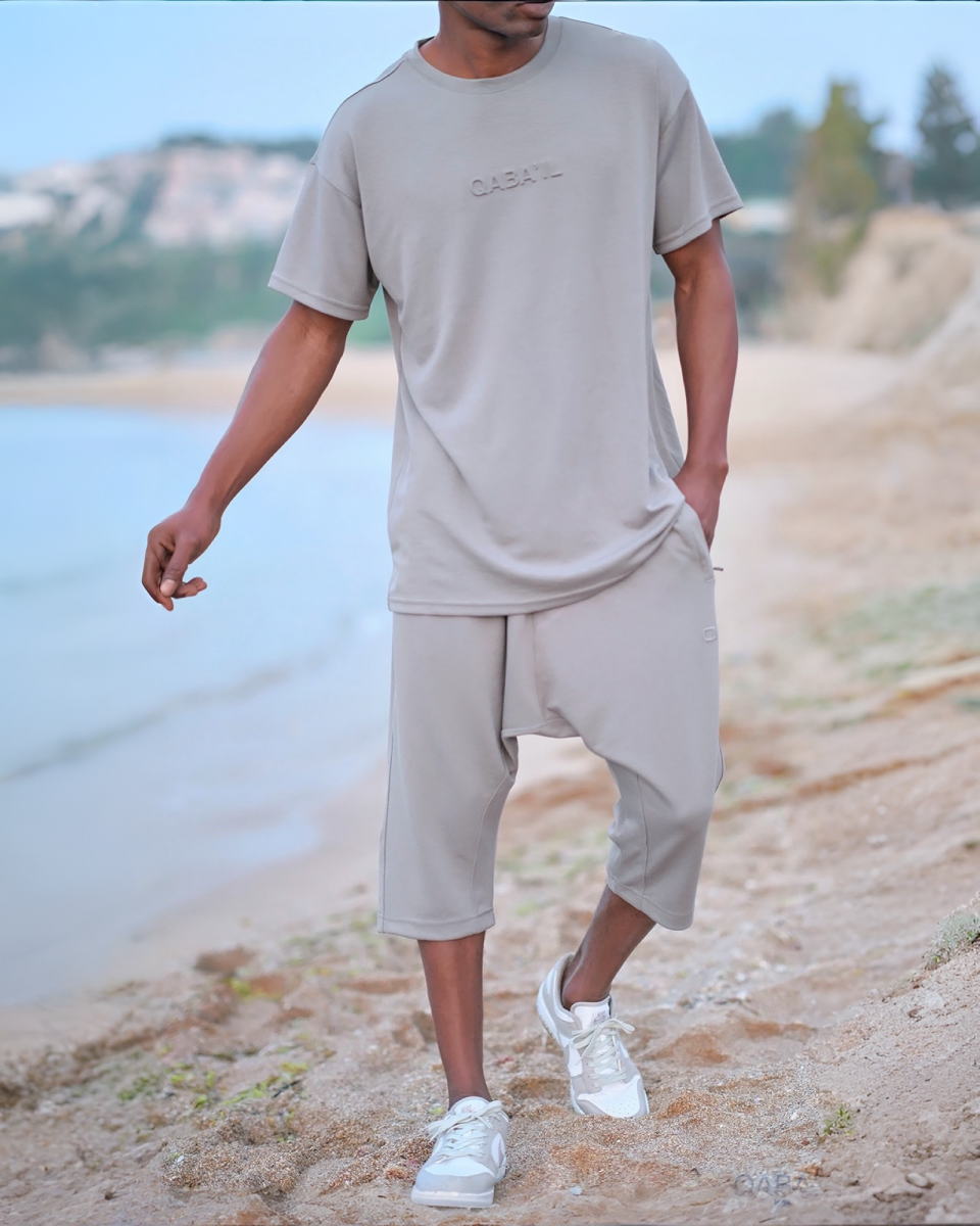 ENSEMBLE OVERSIZED GRIS – QABA’IL S25 | AMCOSMETIK